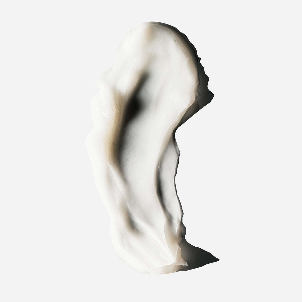 Creamy swatch of Decibelhair thickening conditioner swirled on a white background.